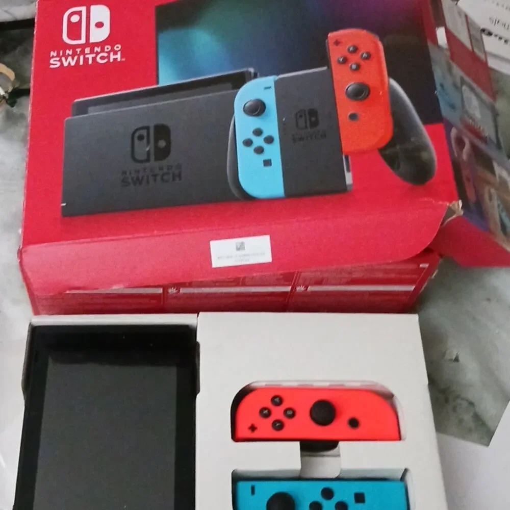 Nintendo Switch Console with Neon Blue Joy-Con